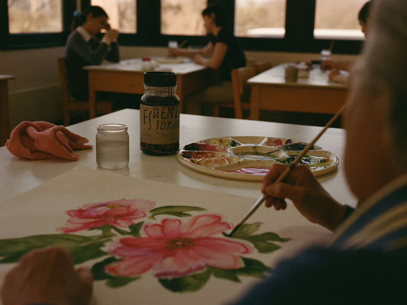 Art studio with easels and paintings in progress